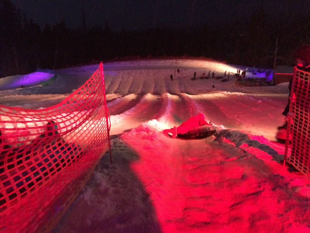 cosmic sledding top of hill