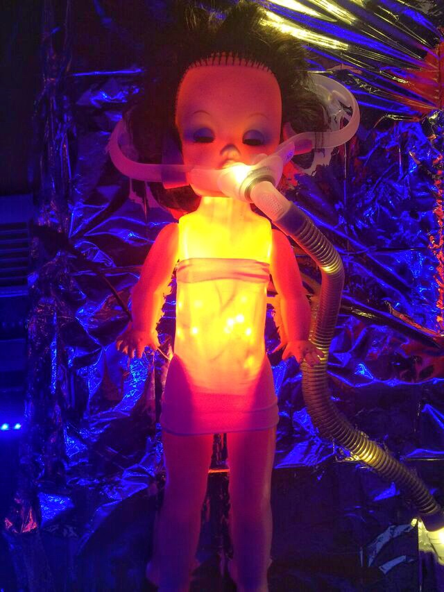 Doll asylum glowing doll